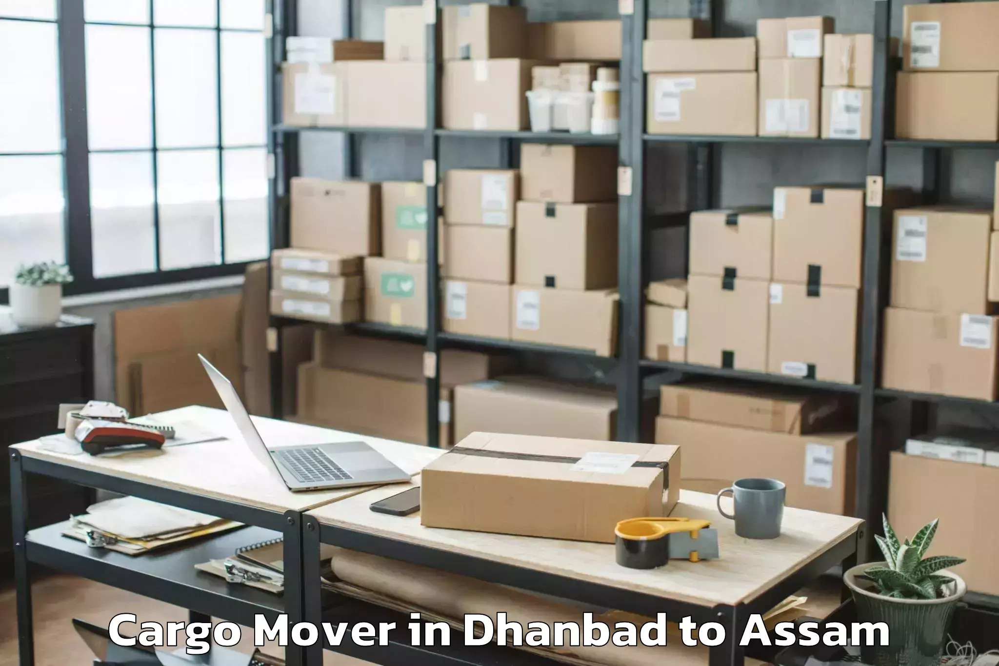 Easy Dhanbad to Borjhar Airport Gau Cargo Mover Booking